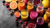 Bunte Smoothies mit frischen Früchten auf dunklem Untergrund mit Textfreiraum, Colorful smoothies with fresh fruits on dark background with text space