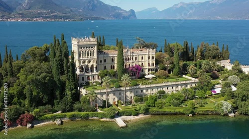 Drone view of Isola del Garda, Lake Garda, Italy. Isola del Garda is an idyllic island with a rich history, ancient walls, and lush greenery, perfect for cultural and garden tours.