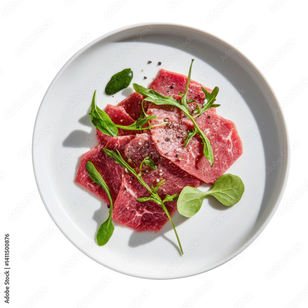 Freshly Sliced Beef with Greens and Spices on a White Plate Freshly Sliced Beef with Greens and Spices on a White Plate