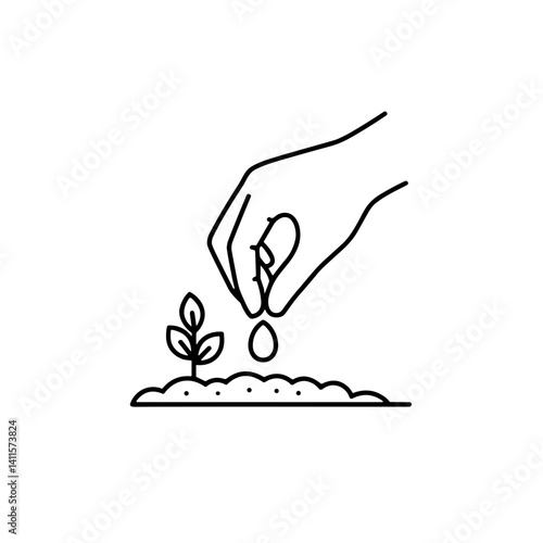 Hand planting seedling in soil with a drop of water  