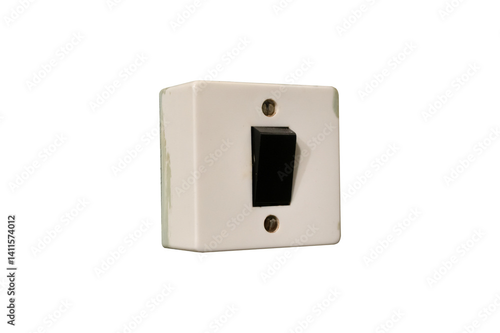 Old electrical light switch with a black toggle and white rectangular base is isolated. Old electrical light switch with a black toggle and white rectangular base is isolated.