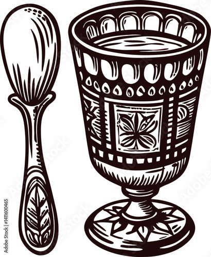 Vintage ornate goblet and spoon with intricate floral designs.