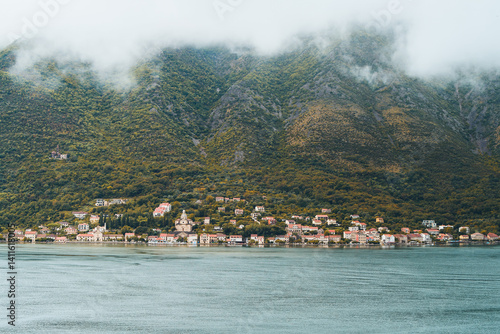 Obraz na płótnie Kotor Bay and mountains with cloudy sky w salonie