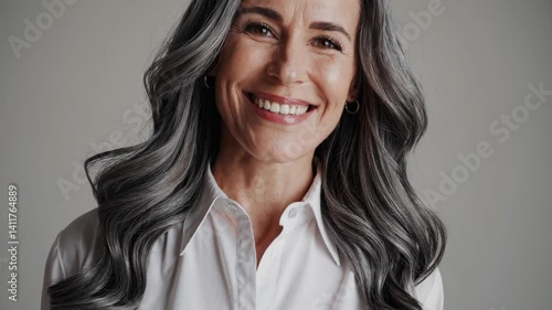 The Smiling Gray-Haired Woman