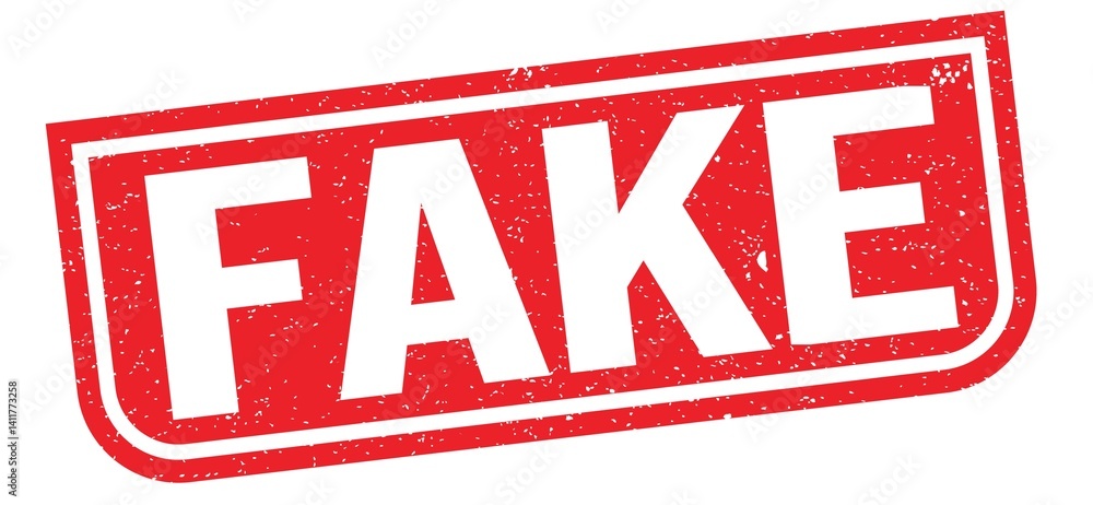 FAKE text written on red stamp sign.