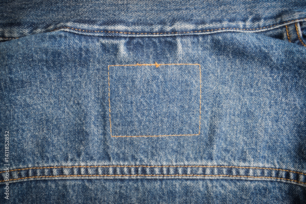 Fototapeta premium seam of blue denim texture background, jean fashion style