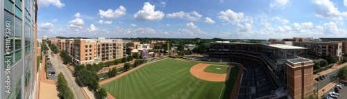 A view of the Durham Bulls Athletic Park, capturing its stadium and surrounding area - sunny sky stands South attraction