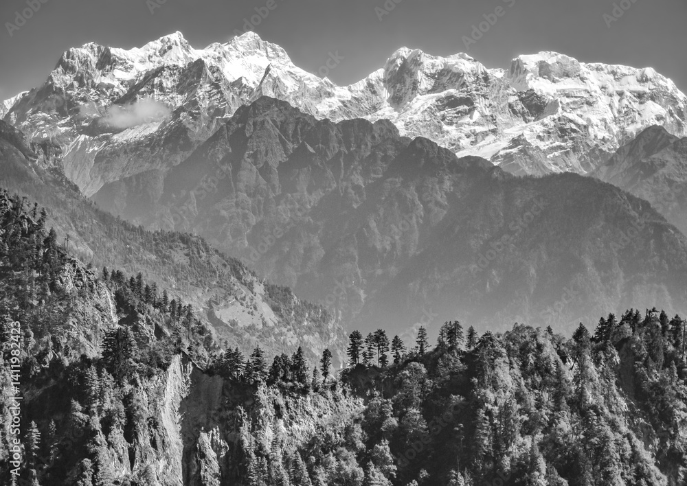 Himalayas, Nepal - The famous hiking on the roof of the world called Annapurna Circuit in the Himalaya range mountain, with little village, buddhist stupa and mountains of 8000 meters.