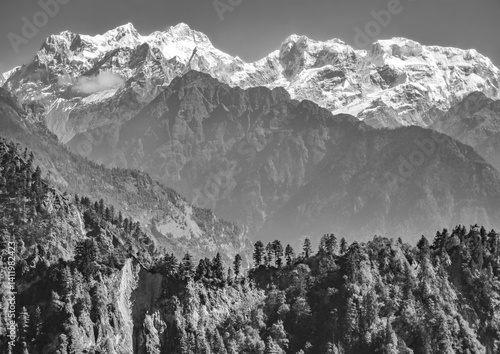 Obraz na płótnie Himalayas, Nepal - The famous hiking on the roof of the world called Annapurna Circuit in the Himalaya range mountain, with little village, buddhist stupa and mountains of 8000 meters. w salonie