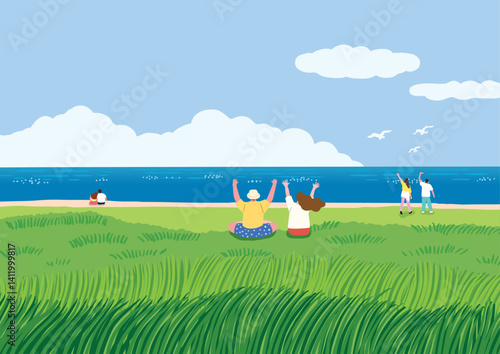 A couple sitting down on the bottom of the grass
