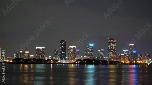 Wallpaper Mural Vibrant city skyline at night with reflections on water Torontodigital.ca