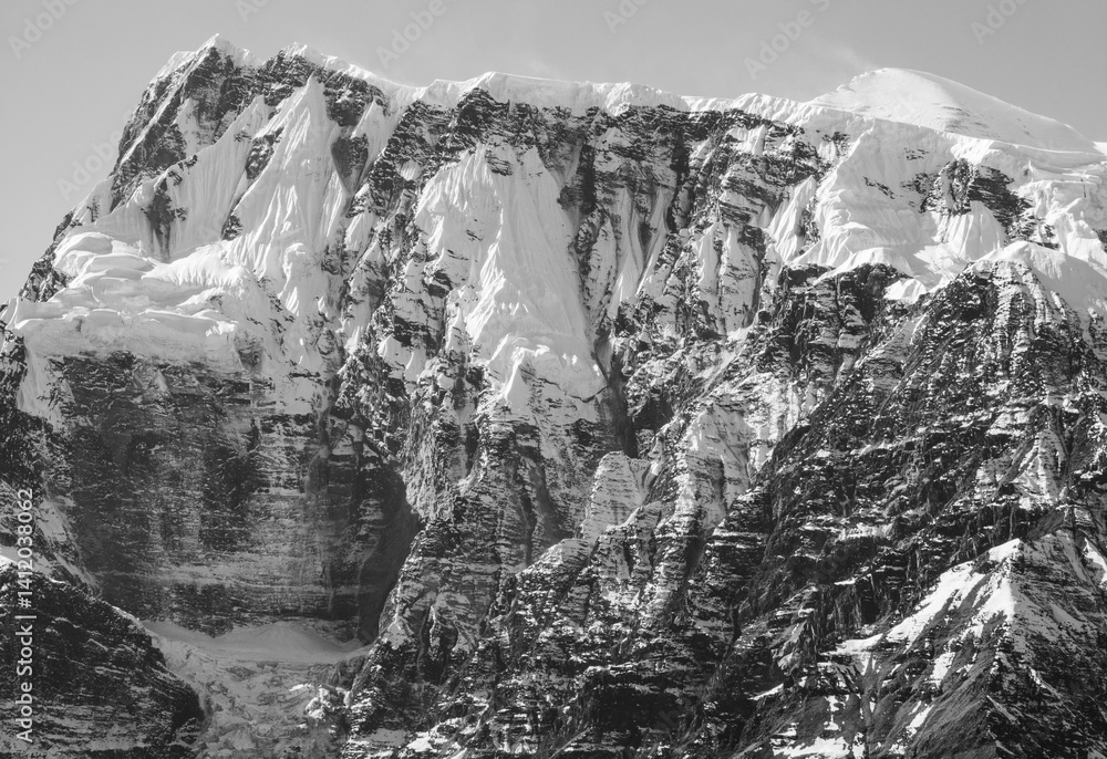 Himalayas, Nepal - The famous hiking on the roof of the world called Annapurna Circuit in the Himalaya range mountain, with little village, buddhist stupa and mountains of 8000 meters.
