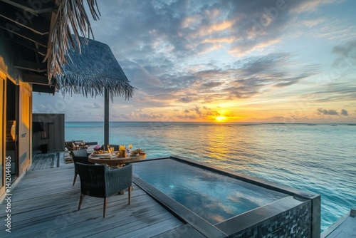 A secluded overwater bungalow with panoramic ocean views and a private deck. The minimalist yet high-end decor, infinity plunge pool, and direct lagoon access define island luxury. A couple enjoys bre