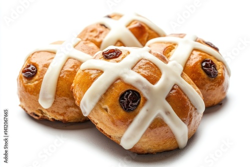 Freshly baked hot cross buns with a white icing cross and raisins, isolated on a transparent background.