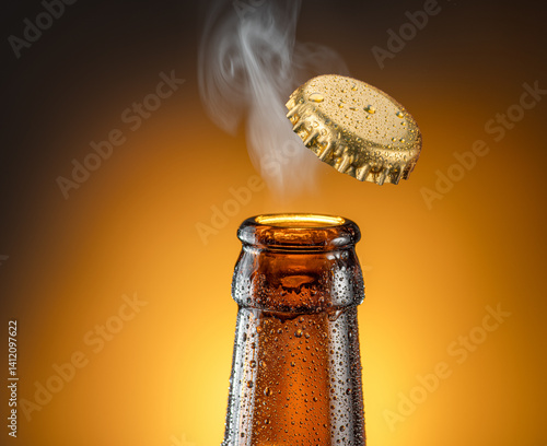 Obraz na plátne Opening beer bottle on brown background