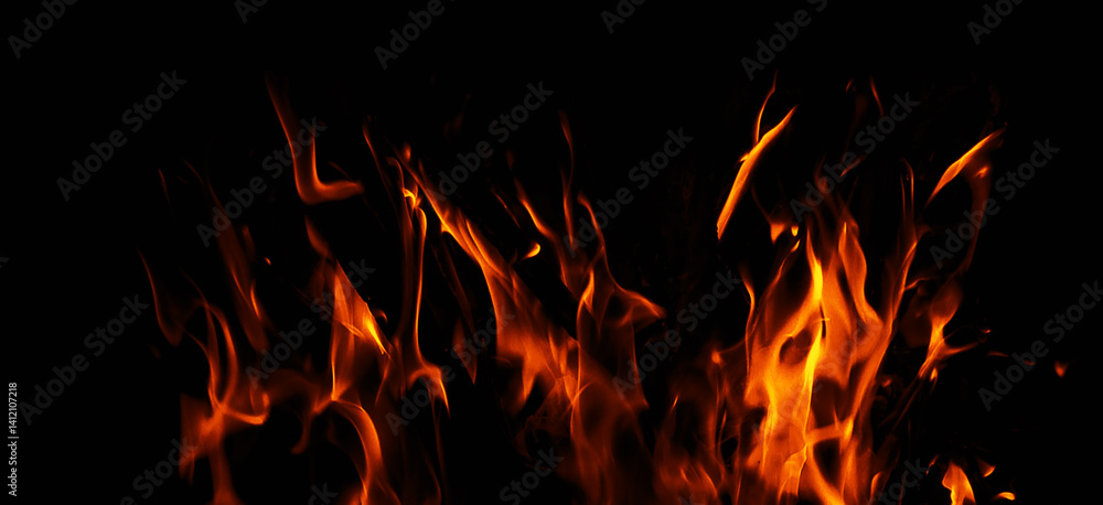 Panoramic view blurred fire on isolated background. Perfect explosion effect for decoration and covering on black background. Concept burn flame and light texture overlays. Panoramic view blurred fire on isolated background. Perfect explosion effect for decoration and covering on black background. Concept burn flame and light texture overlays.