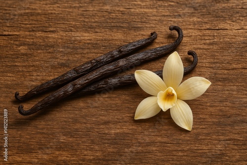 Fresh Vanilla Beans and Flower on Wooden Surface With Natural Textures and Co...