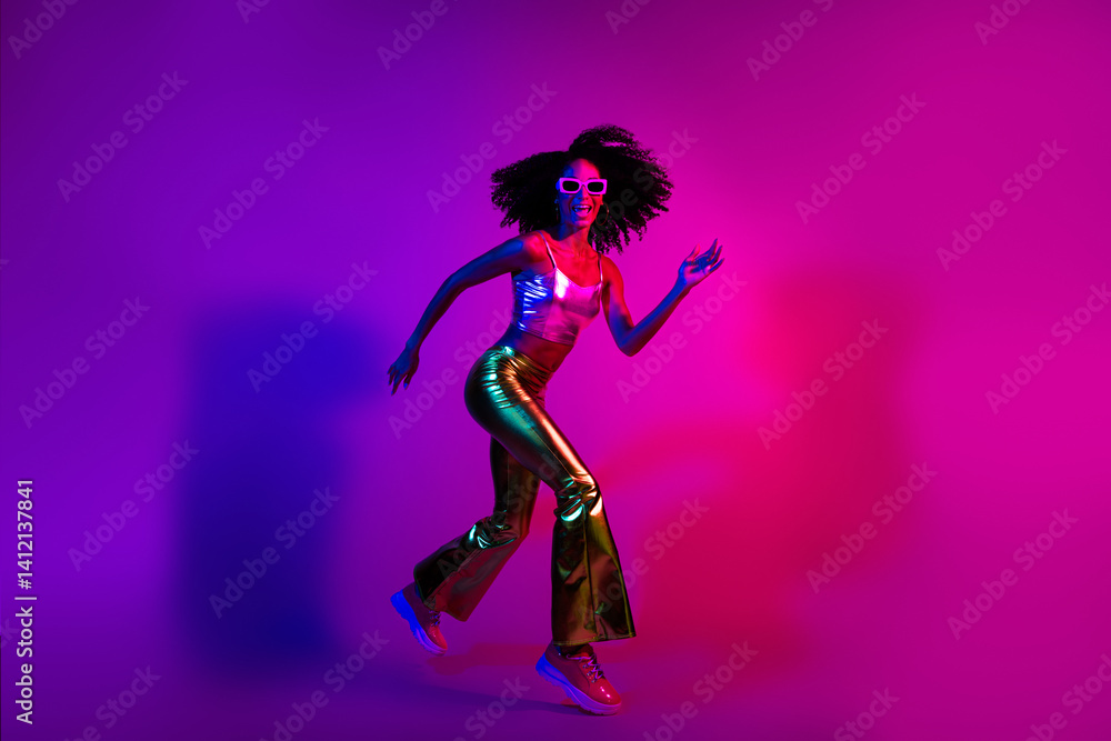 Glamorous young woman dancing with a neon glowing background showcasing retro fashion and positive vibes Glamorous young woman dancing with a neon glowing background showcasing retro fashion and positive vibes
