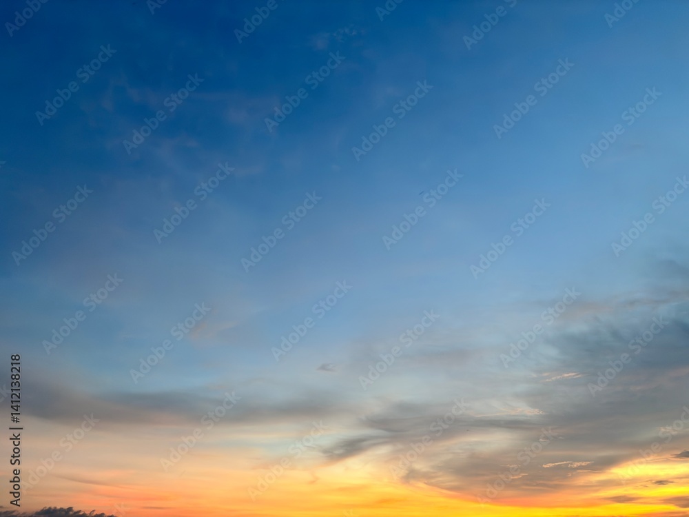 Obraz premium Beautiful sky with natural gradations. Thick clouds in the dusk sky on a winter night. Image of a cloudy sky in the afternoon. View of the night sky with golden light from the evening sun