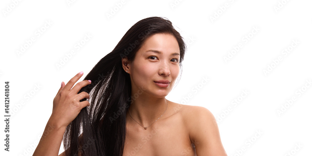 Elegant young Korean woman with spotless, flowing face, silky dark hair against white studio background. Concept of natural beauty, organic cosmetics, skincare branding, wellness