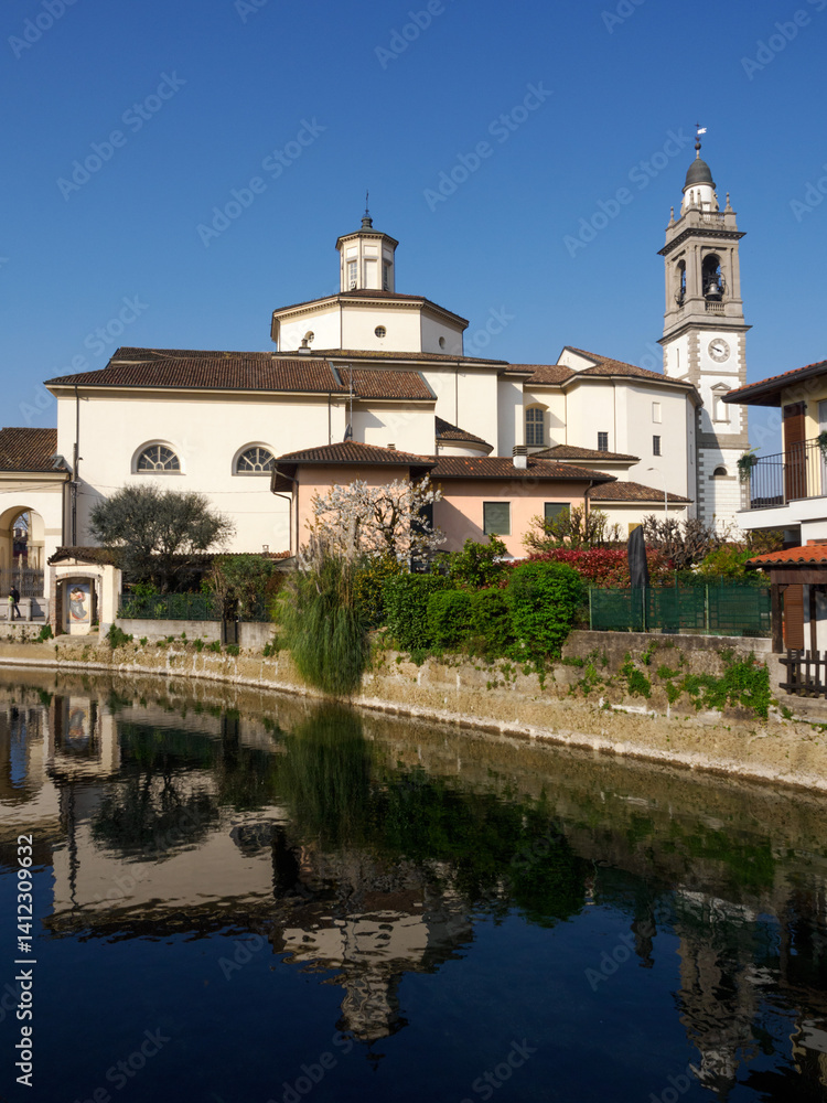 Old buildings along the canal Martesana at Gorgonzola, Italy