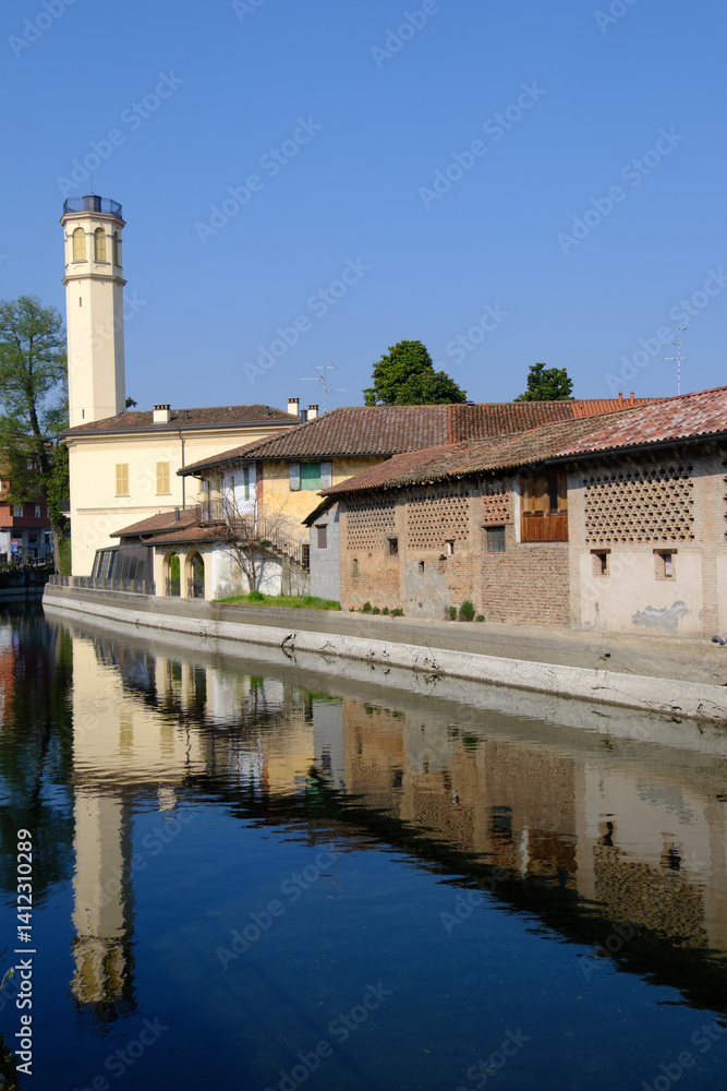 Old buildings along the canal Martesana at Inzago, Italy