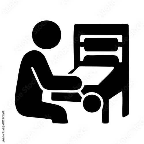 Silhouette icon of printmaker using printing press