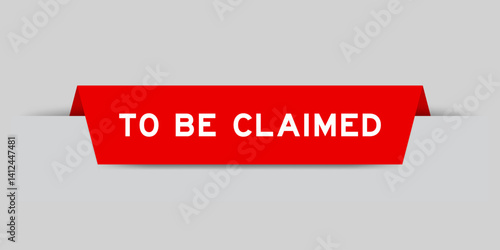 Red color inserted label with word to be claimed on gray background