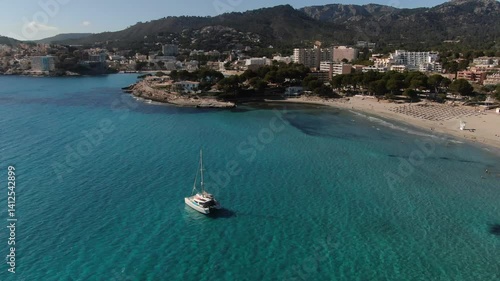 Catamaran anchored  of the sea of the island of Mallorca. Concept of holiday, summer, vacation, relax, calm and enjoy.