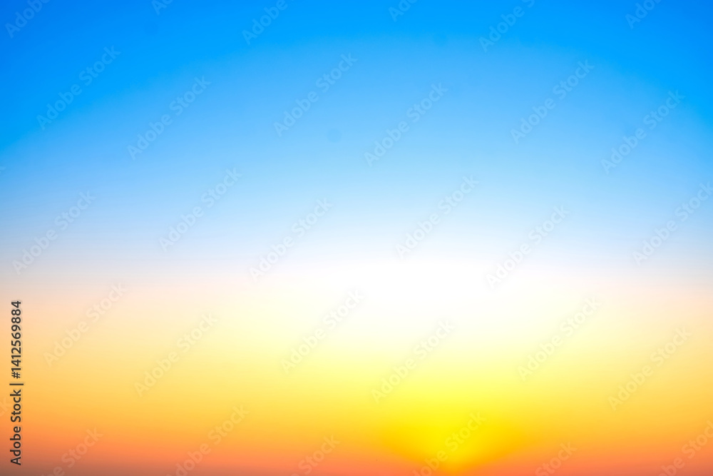 Naklejka premium Beautiful , luxury soft gradient orange gold clouds and sunlight on the blue sky perfect for the background, take in evening,Twilight, Large size, high definition landscape photo