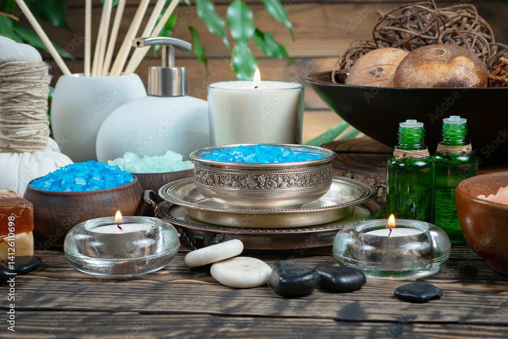 Spa massage items are arranged in a composition on the table.