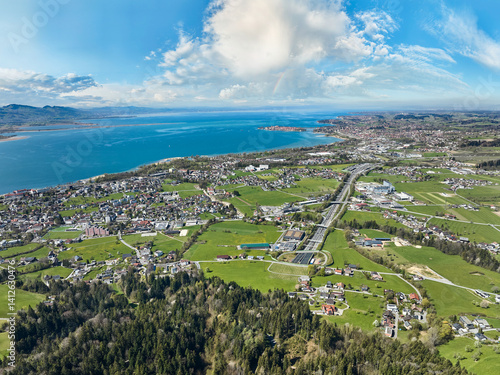 aerial view of the city of Lochau at Lake Constance with the highway entrance to Pfaender Tunnel in Vorarlberg, Austria