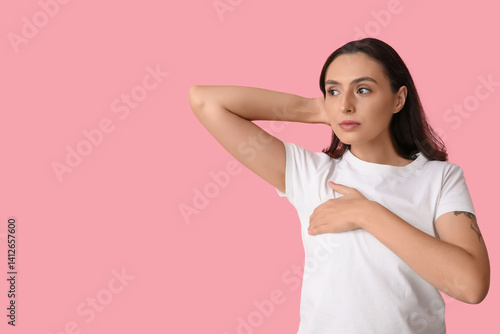Young woman checking her br...
