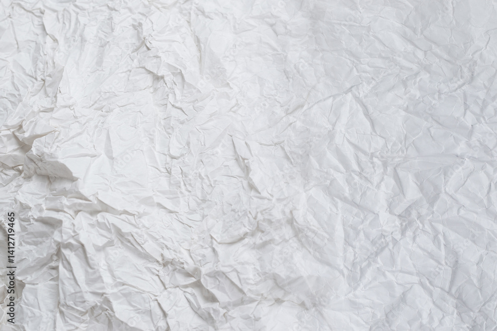 Obraz premium Crumpled white paper background.
