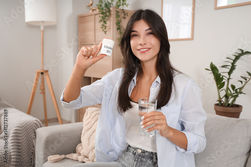 Young woman with vitamin B3...