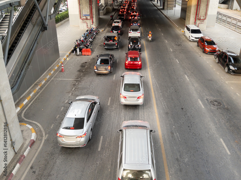 Urban Traffic Jam Under Elevated Train Station.