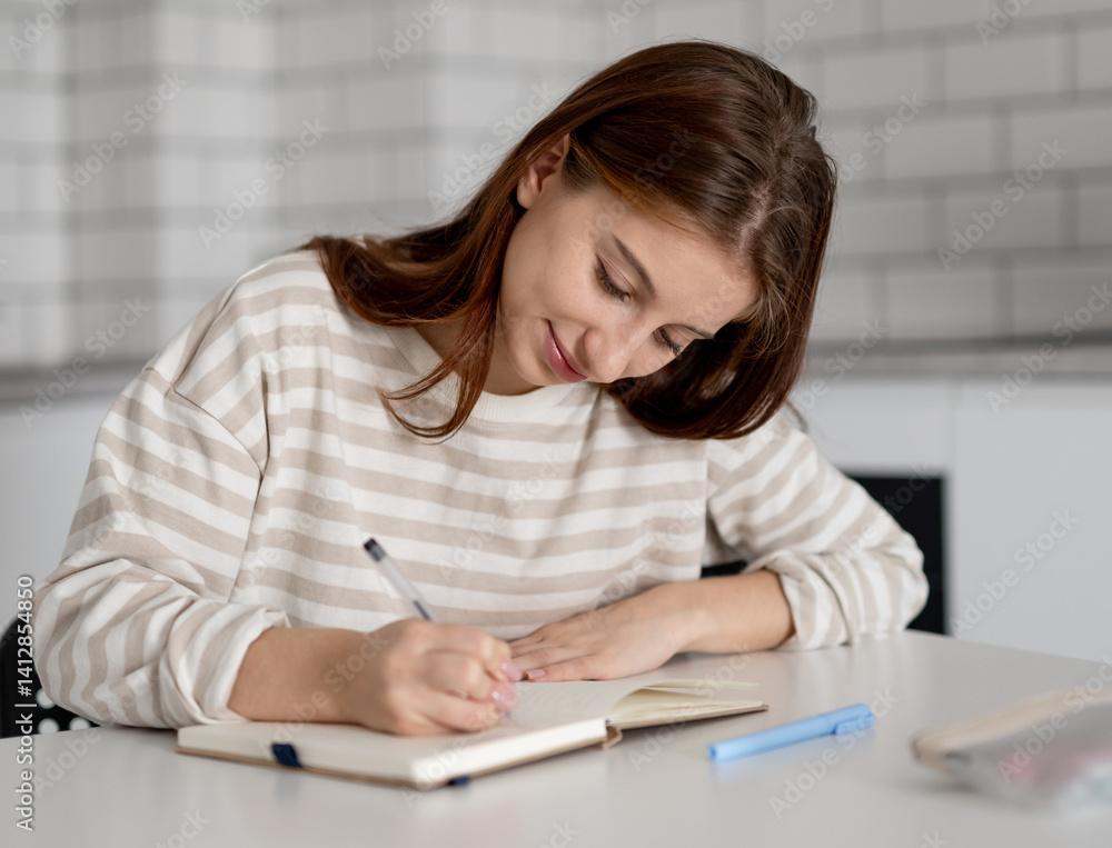 Teen Girl Thinking While Sitting Over Notes At Home Teen Girl Thinking While Sitting Over Notes At Home
