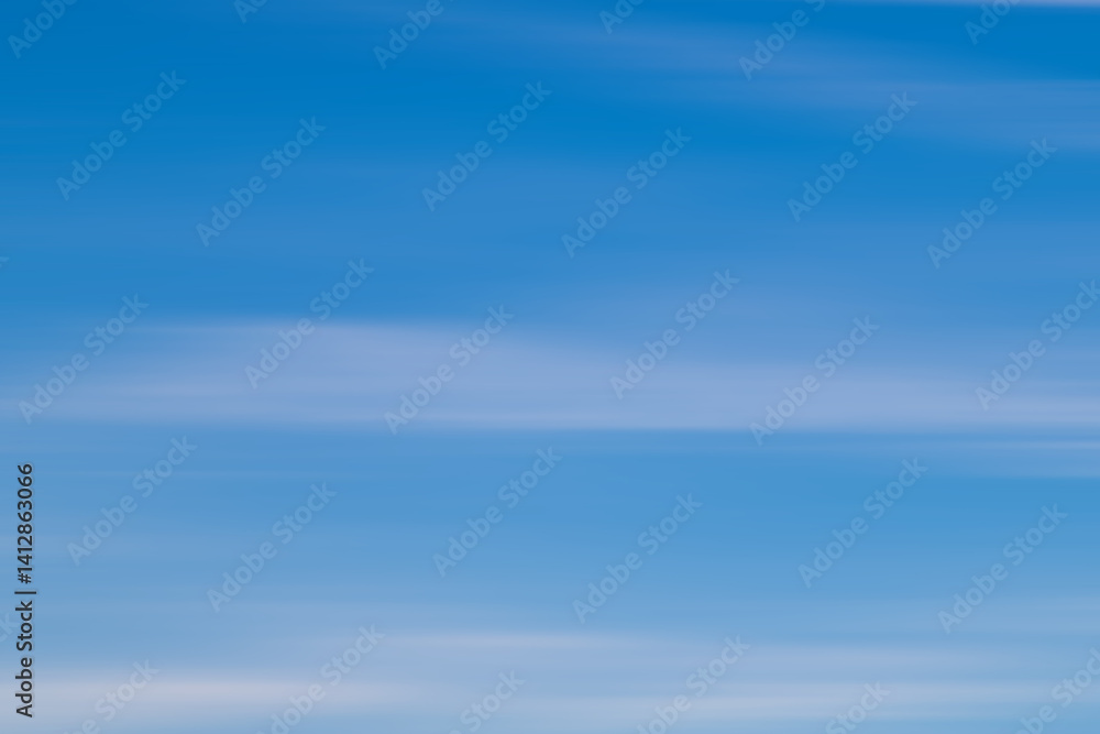 Serene Blue Sky With Wispy White Clouds Overhead