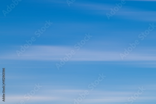 Obraz na płótnie Serene Blue Sky With Wispy White Clouds Overhead w salonie