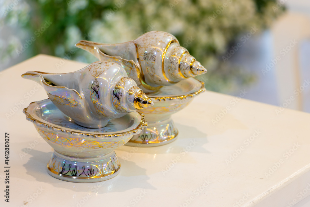 A two Conch shells and water bowls set for water Blessing in wedding ceremony in Thailand