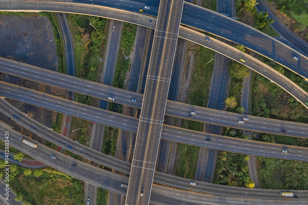 Fototapeta premium Aerial view of Expressway transport traffic road with vehicle movement in morning, Logistic concept.