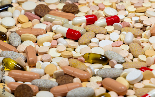 Close-up with various medications pills and capsules