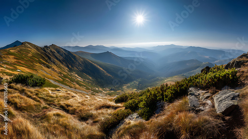 Fototapeta Naklejka Na Ścianę i Meble -  A breathtaking vista of a mountain valley bathed in the soft light of dawn.  Panorama mountain autumn landscape 