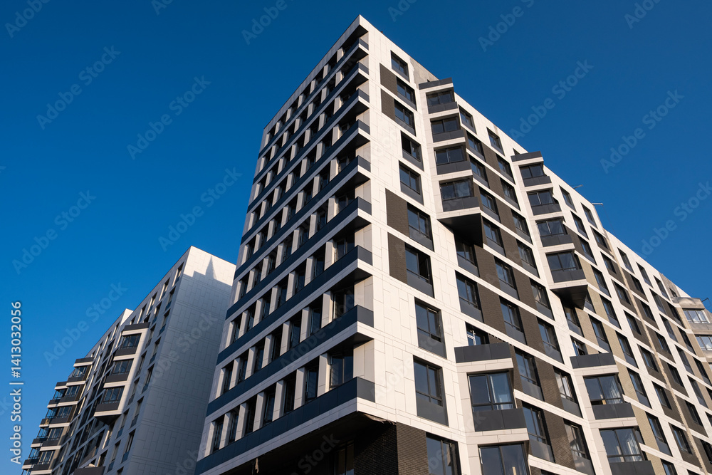 Facade of a modern apartment building. Construction of a residential complex. April 08, 2025 Almaty Kazakhstan Facade of a modern apartment building. Construction of a residential complex. April 08, 2025 Almaty Kazakhstan