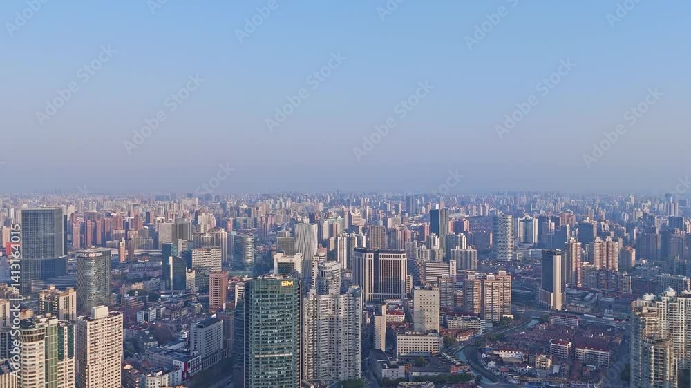 4K real time Aerial view of Shanghai skyscrapers and residential buildings in downtown at sunrise. 4K real time Aerial view of Shanghai skyscrapers and residential buildings in downtown at sunrise.