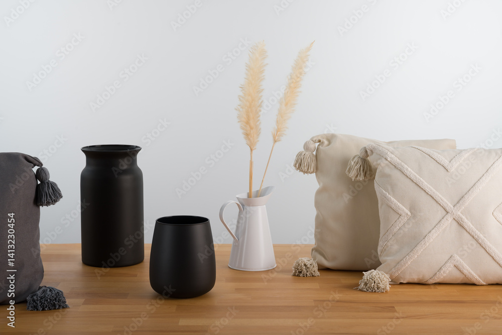 Minimalist Interior Decor: Black Vases and Textured Cushions Still Life