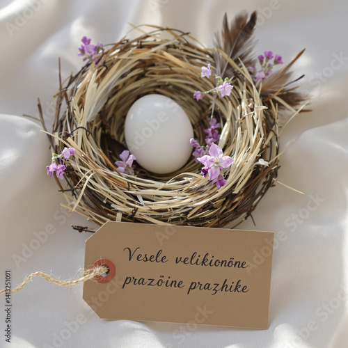 Obraz na płótnie Elegant Easter Nest Arrangement with Purple Flowers w salonie