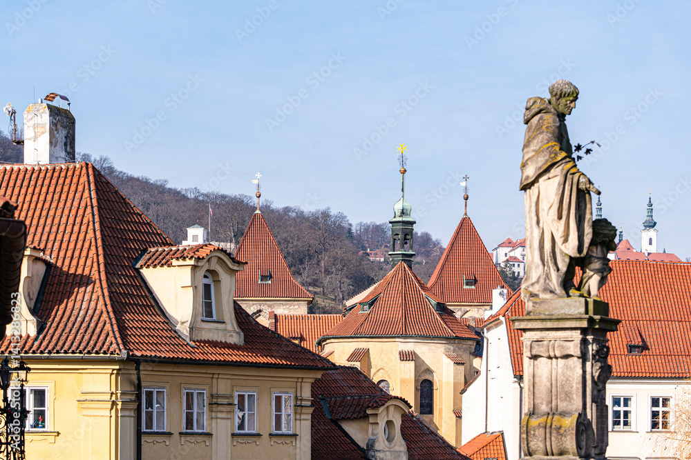 Sculpture and Rooftops in the Hradcany district, Prague, Czech Republic Sculpture and Rooftops in the Hradcany district, Prague, Czech Republic