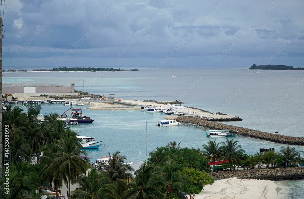 Tropical boats docked at marina on the Maldives