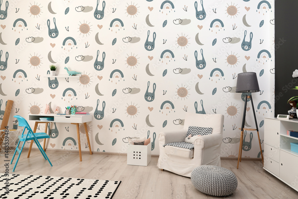 Cozy children's room with stylish furniture and cute wallpaper. Stylish interior
